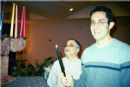 Drs. Robert Kadish and Dan Fertel light the Menorah beofre 130 people at our Pizza and Game Night